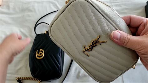 ysl or gucci purse